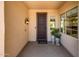 Inviting entryway with a decorative door and neutral color scheme at 13747 W Nogales Dr, Sun City West, AZ 85375