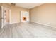 Spacious bedroom with access to bathroom and walk-in closet at 13747 W Nogales Dr, Sun City West, AZ 85375