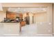 Open kitchen with island and ample cabinet space at 13747 W Nogales Dr, Sun City West, AZ 85375