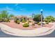 Single-story home with a two-car garage and nicely landscaped front yard at 13747 W Nogales Dr, Sun City West, AZ 85375