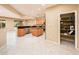 Eat-in kitchen with pantry and access to Gathering room at 13747 W Nogales Dr, Sun City West, AZ 85375