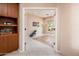 Bright home office with tile flooring and view to backyard at 13747 W Nogales Dr, Sun City West, AZ 85375
