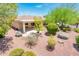Landscaped backyard with patio and desert landscaping at 13747 W Nogales Dr, Sun City West, AZ 85375