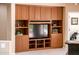 Built-in entertainment center with ample storage at 13747 W Nogales Dr, Sun City West, AZ 85375