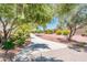 Landscaped walkway through the community at 13747 W Nogales Dr, Sun City West, AZ 85375