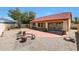 Large backyard, covered patio, and fire pit at 822 W Earll Dr, Phoenix, AZ 85013