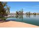 Encanto Park's serene lake with a dock at 822 W Earll Dr, Phoenix, AZ 85013