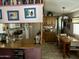 Kitchen with dining area and wood cabinets at 4065 E University Dr # 462, Mesa, AZ 85205