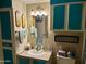 Bathroom with teal vanity and shower at 4065 E University Dr # 462, Mesa, AZ 85205