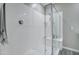 Large walk-in shower with built-in bench and glass enclosure at 19731 N Ben Ct, Maricopa, AZ 85138