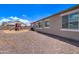 Backyard with playset and gravel ground cover at 19731 N Ben Ct, Maricopa, AZ 85138