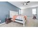 Spacious bedroom with a king-size bed and exercise bike at 19731 N Ben Ct, Maricopa, AZ 85138