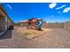 Backyard with playset and gravel ground cover at 19731 N Ben Ct, Maricopa, AZ 85138