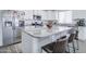 Island kitchen with granite countertops and stainless steel appliances at 19731 N Ben Ct, Maricopa, AZ 85138