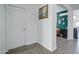 Bright entryway with wood-look floors and access to a living area at 19731 N Ben Ct, Maricopa, AZ 85138