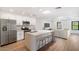 Modern kitchen with island, stainless steel appliances, and white cabinets at 16844 E Ave Of The Fountains -- # 201, Fountain Hills, AZ 85268