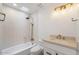 Modern bathroom with white cabinets and gold fixtures at 16844 E Ave Of The Fountains -- # 201, Fountain Hills, AZ 85268