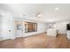 Bright and airy living room with hardwood floors and large window at 16844 E Ave Of The Fountains -- # 201, Fountain Hills, AZ 85268