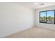 Spacious bedroom with ample natural light and carpeted floors at 16844 E Ave Of The Fountains -- # 202, Fountain Hills, AZ 85268