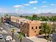 Aerial view of commercial buildings with mountain backdrop at 16844 E Ave Of The Fountains -- # 202, Fountain Hills, AZ 85268