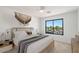 Bright bedroom with large window offering scenic views at 16844 E Ave Of The Fountains -- # 202, Fountain Hills, AZ 85268