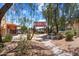 Landscaped courtyard with seating areas and desert plants at 16844 E Ave Of The Fountains -- # 202, Fountain Hills, AZ 85268
