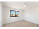Simple bedroom with window and neutral wall colors at 16844 E Ave Of The Fountains -- # 202, Fountain Hills, AZ 85268