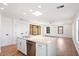 Modern kitchen with white cabinets, stainless steel appliances, and an island at 16844 E Ave Of The Fountains -- # 202, Fountain Hills, AZ 85268