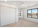 Spacious bedroom with double door closet and window at 16844 E Ave Of The Fountains -- # 202, Fountain Hills, AZ 85268