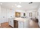 Modern kitchen with white cabinets, stainless steel appliances, and an island at 16844 E Ave Of The Fountains -- # 202, Fountain Hills, AZ 85268