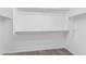 Large walk-in closet with ample shelving and hanging space at 17214 W Gibson Ln, Goodyear, AZ 85338