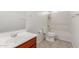 Clean bathroom with a shower/tub combo and wood vanity at 17214 W Gibson Ln, Goodyear, AZ 85338