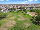 Large grassy park with playground equipment at 2084 N 214Th Dr, Buckeye, AZ 85396