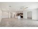 Bright dining area with tile flooring and modern chandelier at 2084 N 214Th Dr, Buckeye, AZ 85396