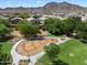 Community playground with swings and play area at 2084 N 214Th Dr, Buckeye, AZ 85396