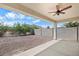 Covered patio offering views of the desert landscape and mountains at 2084 N 214Th Dr, Buckeye, AZ 85396