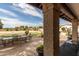 Relaxing patio with outdoor seating and putting green at 5202 W Soft Wind Dr, Glendale, AZ 85310