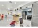 Modern kitchen with island, stainless steel appliances and open floor plan at 131 W Tulsa St, Chandler, AZ 85225