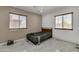 Bedroom with two windows and marble tile floor at 131 W Tulsa St, Chandler, AZ 85225