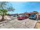 Street view of two homes with carports and gravel driveways at 131 W Tulsa St, Chandler, AZ 85225