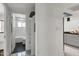 Hallway with linen closet and view of bathroom and kitchen at 131 W Tulsa St, Chandler, AZ 85225