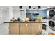 Kitchen island with granite countertop and stainless steel appliances at 131 W Tulsa St, Chandler, AZ 85225