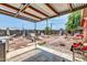 Backyard patio cover with cluttered area at 131 W Tulsa St, Chandler, AZ 85225