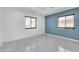 Spacious bedroom with two windows and marble tile floors at 131 W Tulsa St, Chandler, AZ 85225