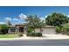 Beautiful single-story home with stone accents and a two-car garage at 9904 E Monterey Ave, Mesa, AZ 85209