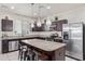 Modern kitchen with stainless steel appliances and granite countertops at 4809 E Fire Opal Ln, San Tan Valley, AZ 85143