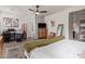 Spacious bedroom with a desk and built-in shelving at 4809 E Fire Opal Ln, San Tan Valley, AZ 85143