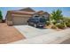 Single-story home with a two-car garage at 4809 E Fire Opal Ln, San Tan Valley, AZ 85143