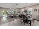 Spacious living room and dining area with light flooring and modern furniture at 4809 E Fire Opal Ln, San Tan Valley, AZ 85143