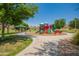 Playground with slides, climbing structures, and shaded areas at 4809 E Fire Opal Ln, San Tan Valley, AZ 85143